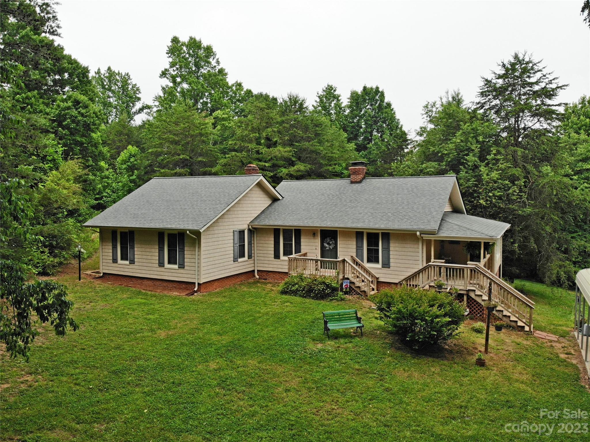 1151 Carpenters Grove Church Road Lawndale, NC 28090 - Photo 42 of 46 a front view of a house with a yard