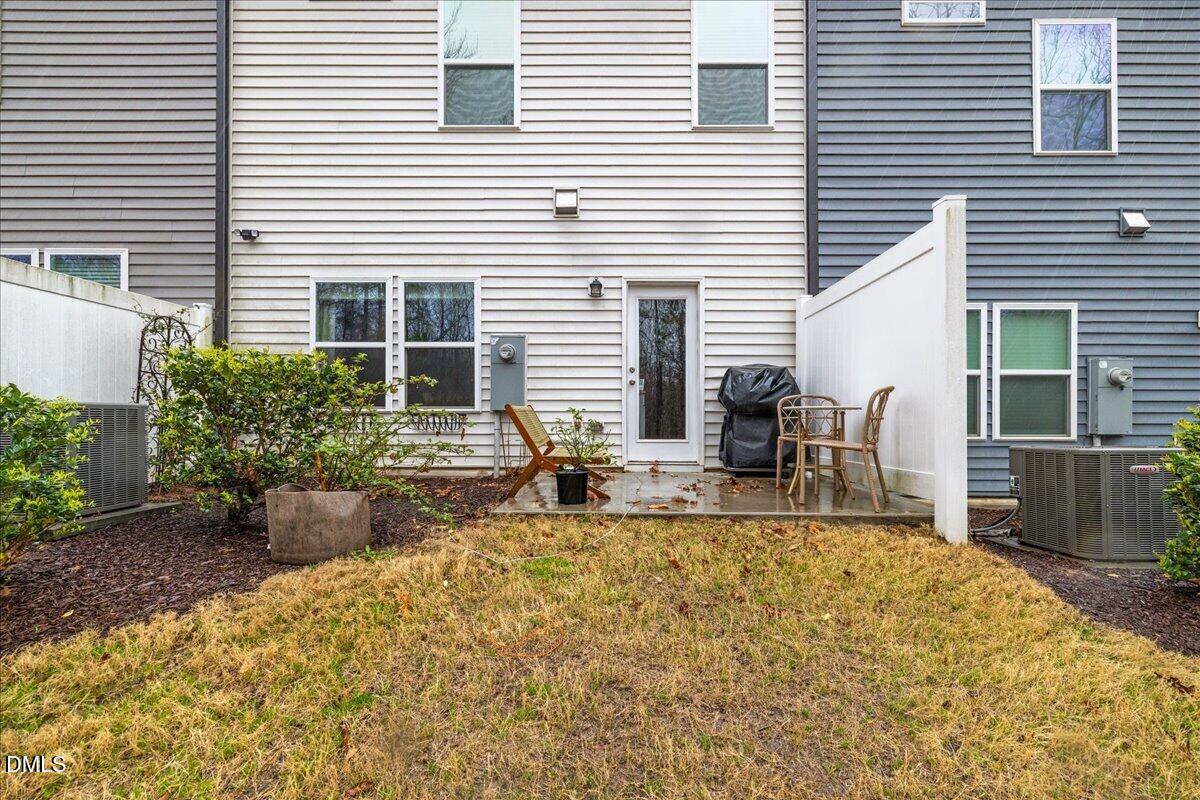 845 Oak Center Drive Raleigh, NC 27610 - Photo 26 of 29 a house view with a outdoor seating