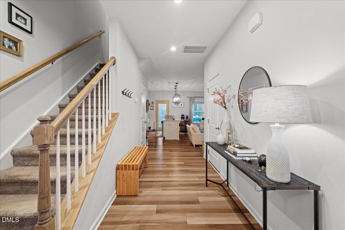 845 Oak Center Drive Raleigh, NC 27610 - Photo 5 of 29 a very nice looking room with many windows