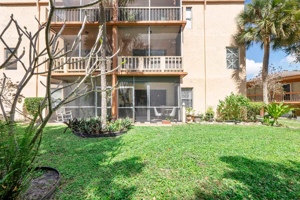 a view of a garden with a fountain