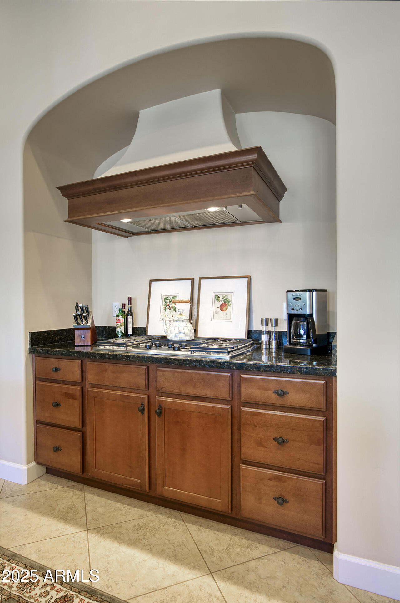 9190 East Hoverland Road Scottsdale, AZ 85255 - Photo 14 of 35 a kitchen with granite countertop cabinets and stainless steel appliances