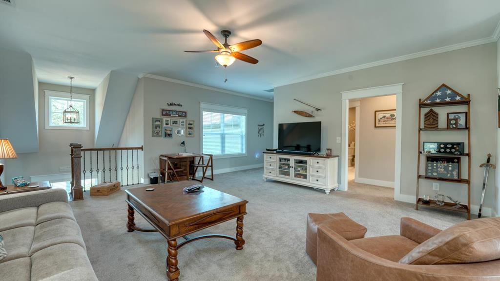 31 Elf School Road Hayesville, NC 28904 - Photo 42 of 59 a living room with furniture and a flat screen tv