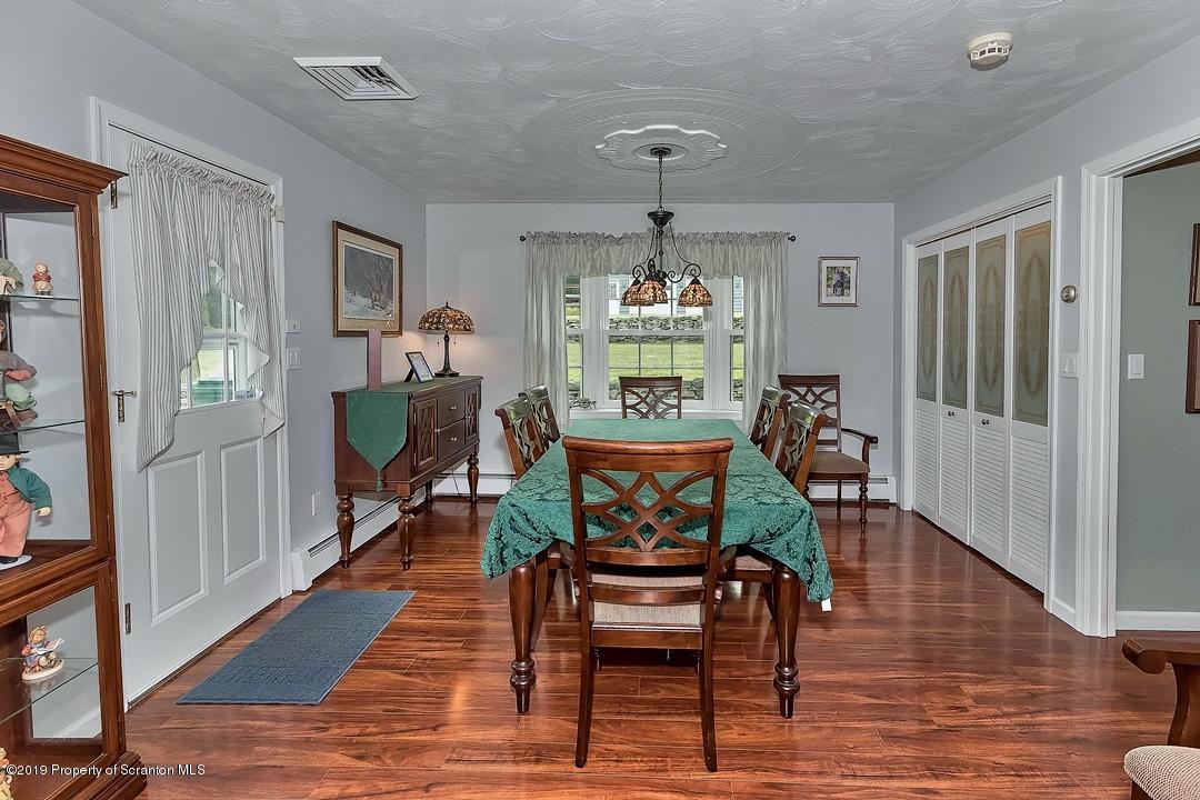 368 Maple Lake Road Moscow, PA 18444 - Photo 21 of 51 a living room with furniture and a wooden floor