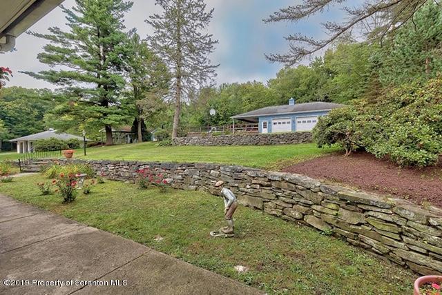 368 Maple Lake Road Moscow, PA 18444 - Photo 35 of 51 a front view of a house with a yard