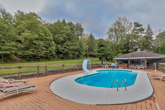 368 Maple Lake Road Moscow, PA 18444 - Photo 41 of 51 a view of a swimming pool with a patio