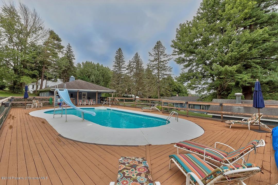 368 Maple Lake Road Moscow, PA 18444 - Photo 42 of 51 a view of a swimming pool with a patio