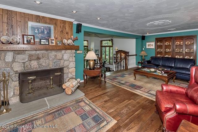 368 Maple Lake Road Moscow, PA 18444 - Photo 5 of 51 a living room with furniture and a fireplace