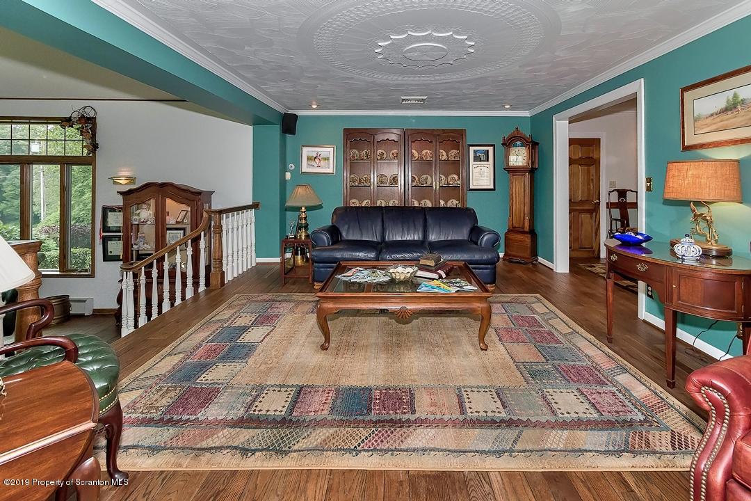 368 Maple Lake Road Moscow, PA 18444 - Photo 6 of 51 a living room with furniture and a table
