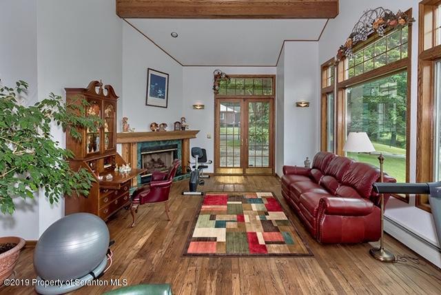 368 Maple Lake Road Moscow, PA 18444 - Photo 9 of 51 a living room with furniture and a fireplace