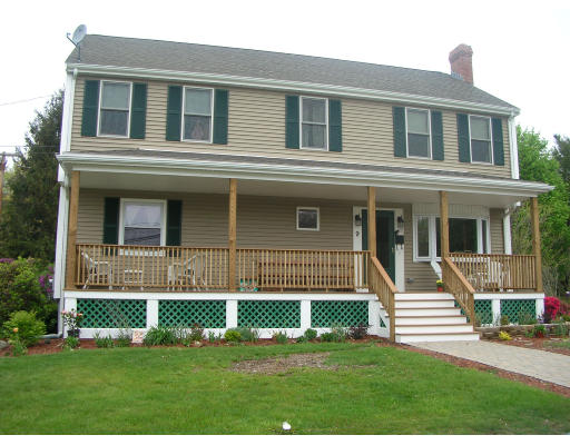 9 Walsh Road Holbrook, MA 02343 - Photo 1 of 19 a front view of a house with a yard