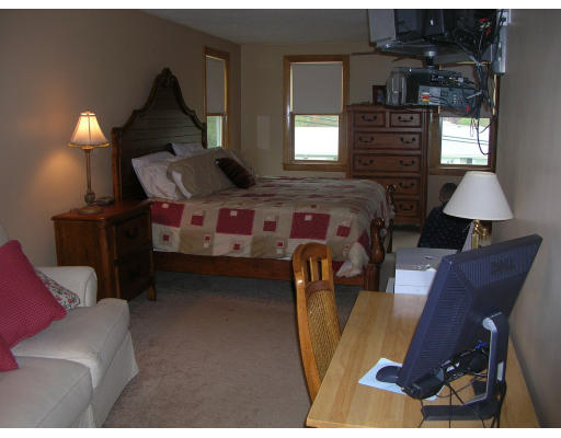 9 Walsh Road Holbrook, MA 02343 - Photo 15 of 19 a living room with furniture and a fireplace