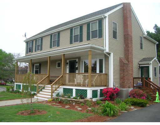 9 Walsh Road Holbrook, MA 02343 - Photo 2 of 19 a front view of a house with a yard