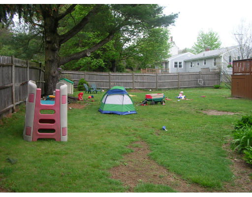 9 Walsh Road Holbrook, MA 02343 - Photo 6 of 19 a view of backyard with outdoor seating and green space