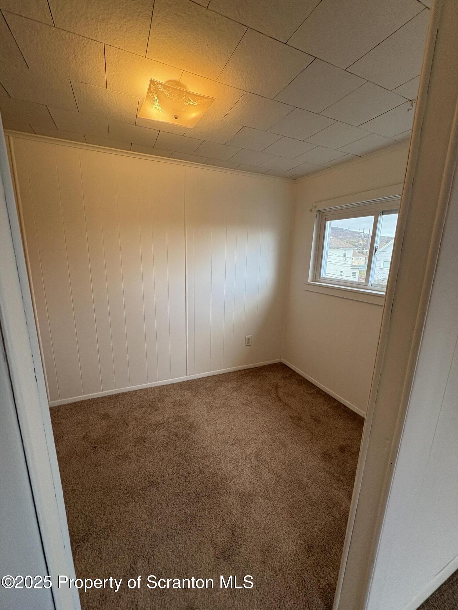1819 Clearview Street, Unit L 109 Scranton, PA 18504 - Photo 12 of 23 an empty room with a window