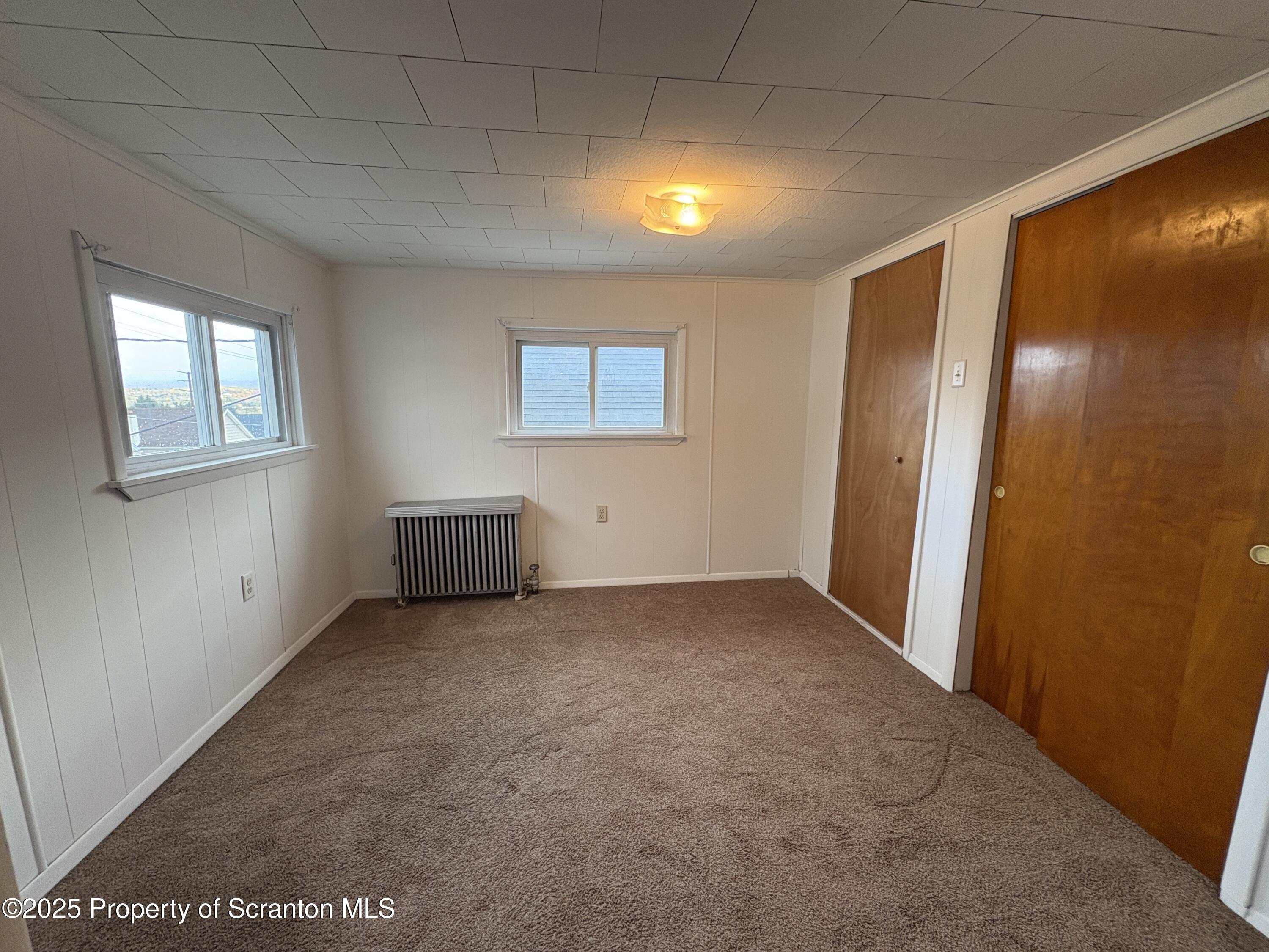 1819 Clearview Street, Unit L 109 Scranton, PA 18504 - Photo 14 of 23 a view of an empty room with a window