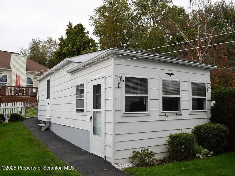 1819 Clearview Street, Unit L 109 Scranton, PA 18504 - Photo 21 of 23 a view of a house with a yard