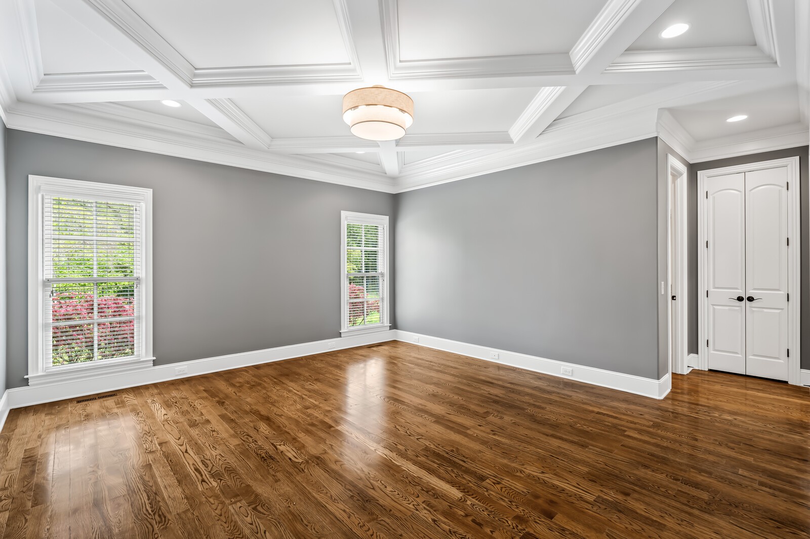 926 Evans Road Nashville, TN 37204 - Photo 21 of 53 an empty room with wooden floor and windows