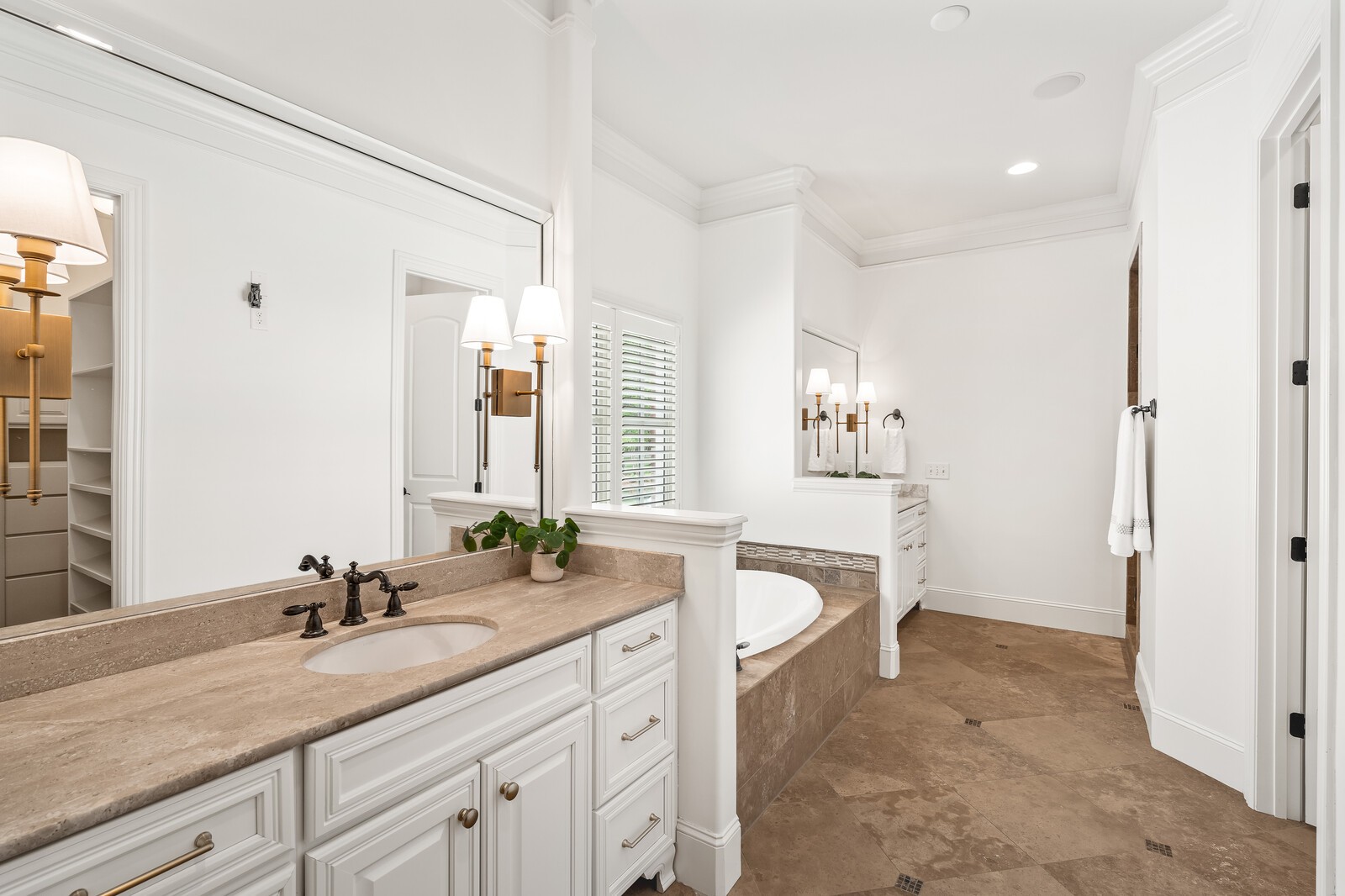 926 Evans Road Nashville, TN 37204 - Photo 22 of 53 a spacious bathroom with a granite countertop sink a mirror and a