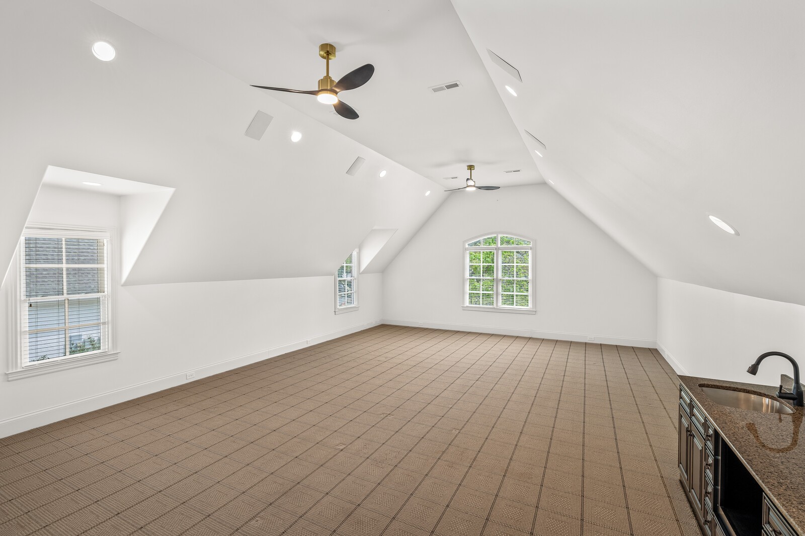 926 Evans Road Nashville, TN 37204 - Photo 32 of 53 an empty room with windows and ceiling fan