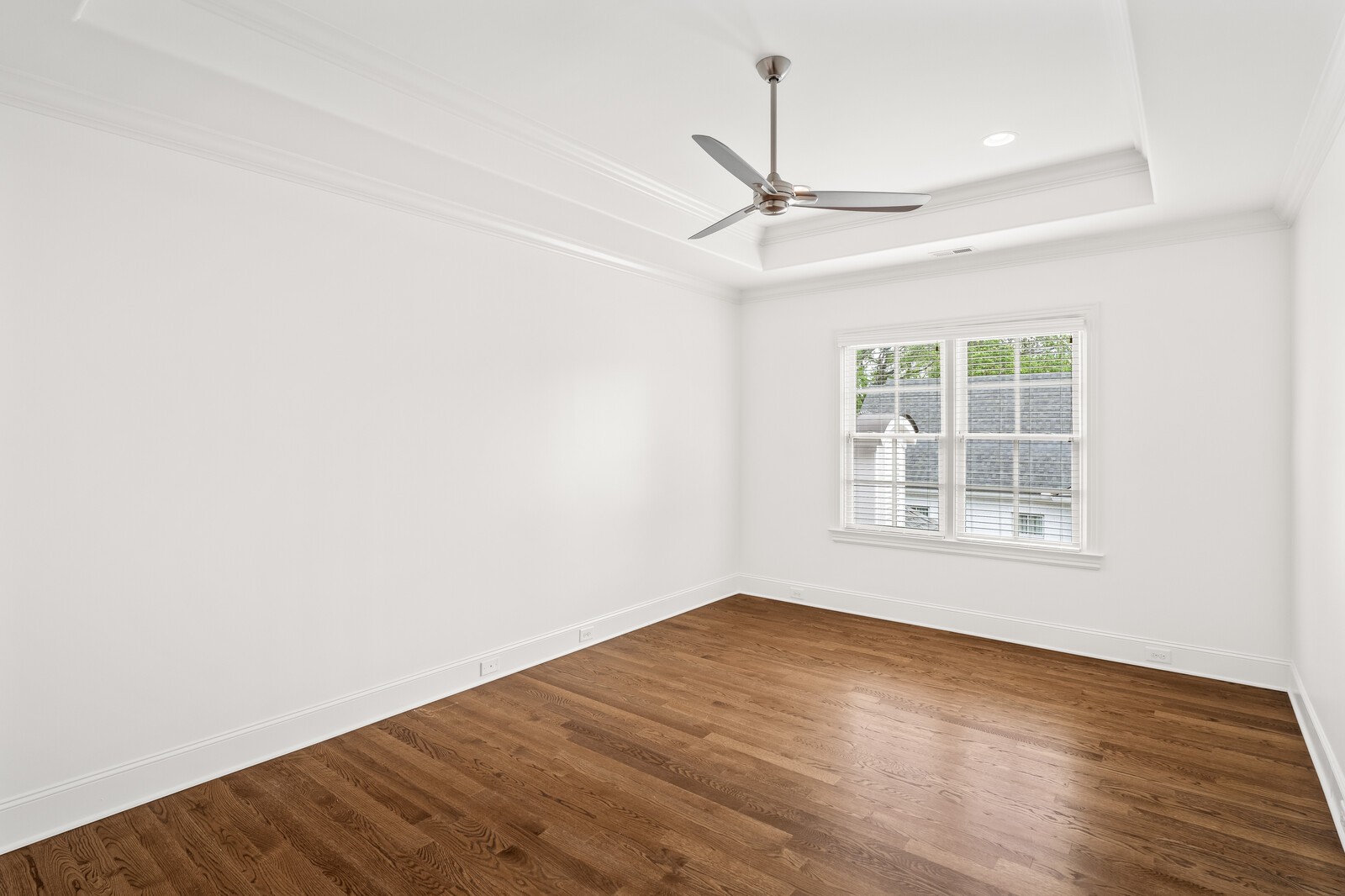 926 Evans Road Nashville, TN 37204 - Photo 35 of 53 an empty room with wooden floor ceiling fan and windows