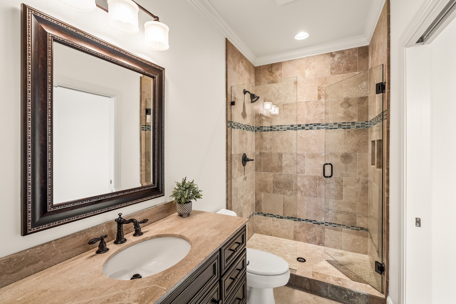 926 Evans Road Nashville, TN 37204 - Photo 39 of 53 a bathroom with a granite countertop sink toilet and shower