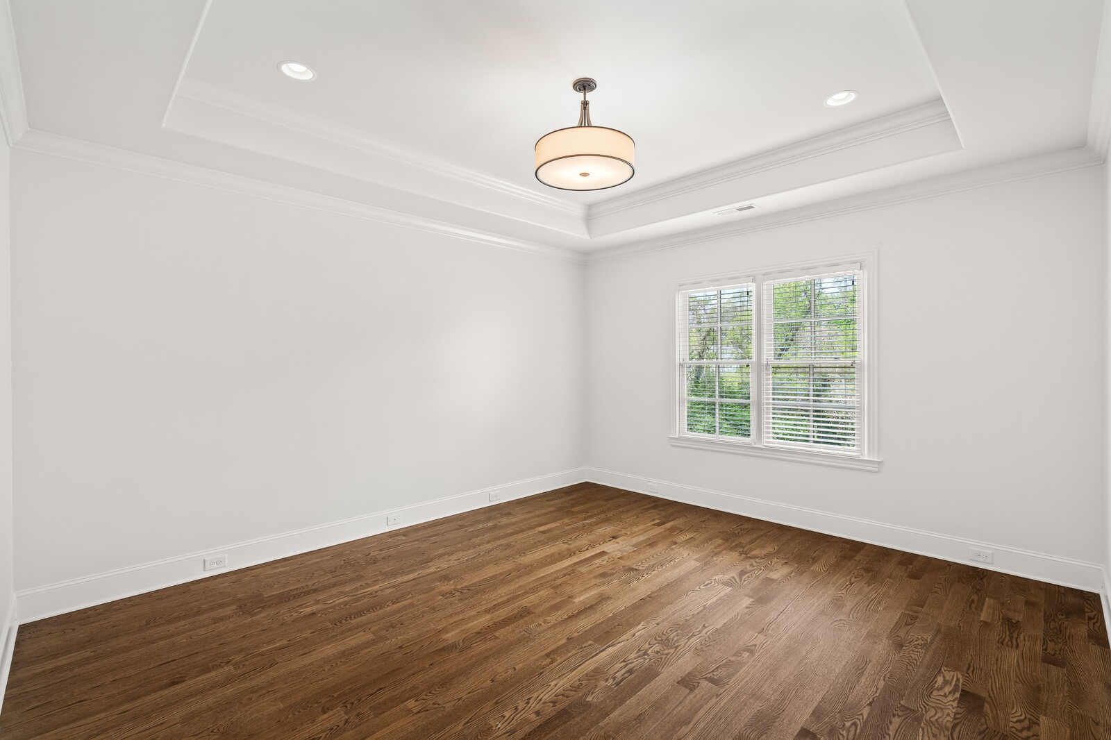 926 Evans Road Nashville, TN 37204 - Photo 41 of 53 an empty room with wooden floor and windows