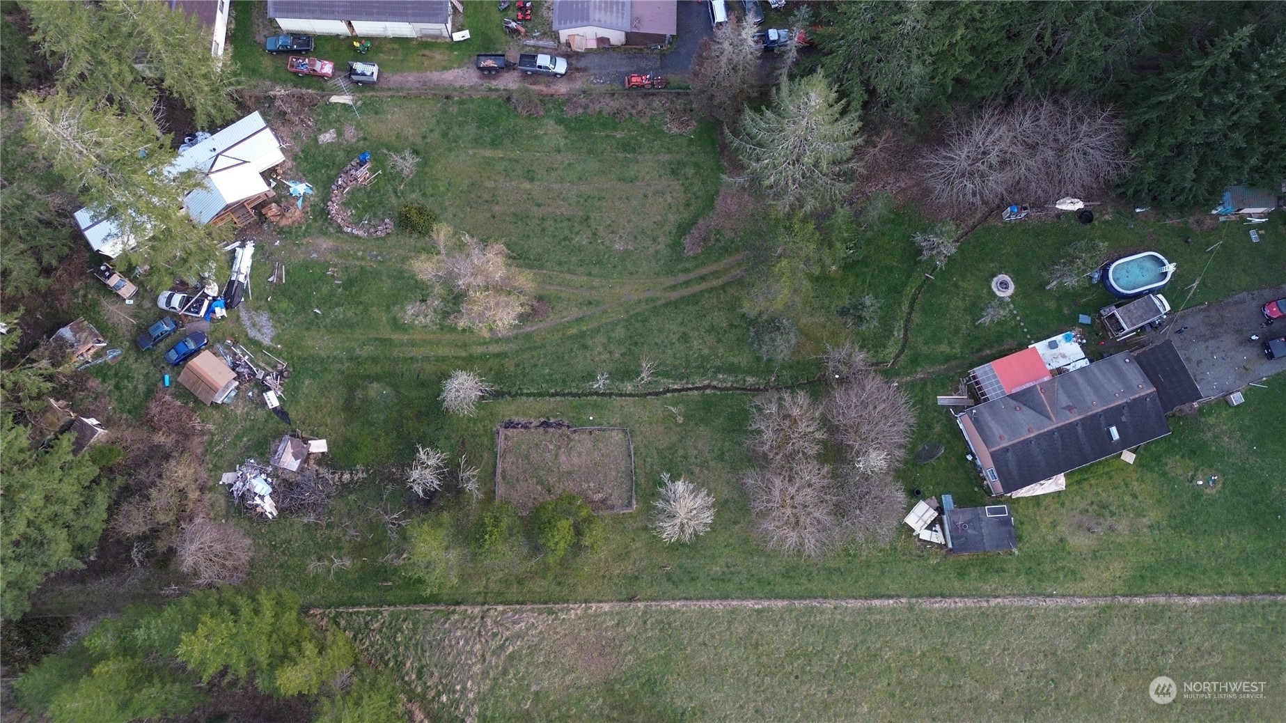 1292 North Fork Road Chehalis, WA 98532 - Photo 3 of 24 an aerial view of a house with a yard