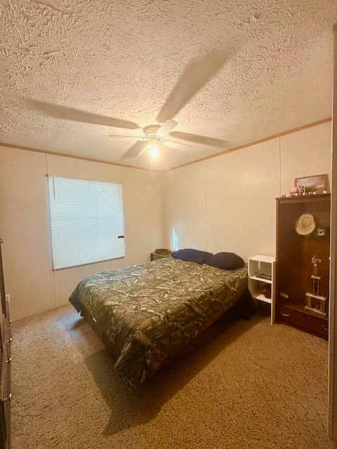 14021 Peachstone Road Crawford, TN 38554 - Photo 17 of 20 a bedroom with a bed and cabinets