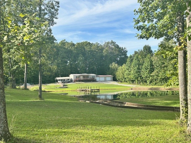 14021 Peachstone Road Crawford, TN 38554 - Photo 4 of 20 a view of a swimming pool with a big yard