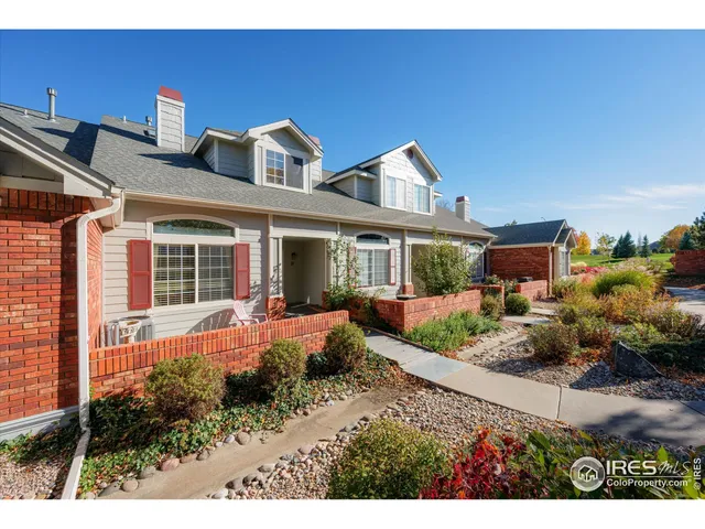 a front view of a house with a porch