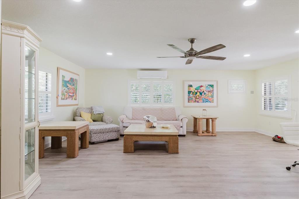 11521 Rose Tree Drive New Port Richey, FL 34654 - Photo 12 of 37 a living room with furniture and window