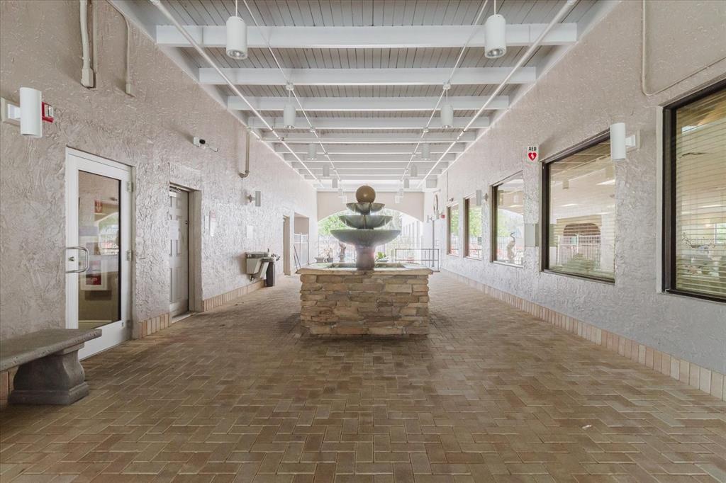 11521 Rose Tree Drive New Port Richey, FL 34654 - Photo 23 of 37 a view of a hallway with windows