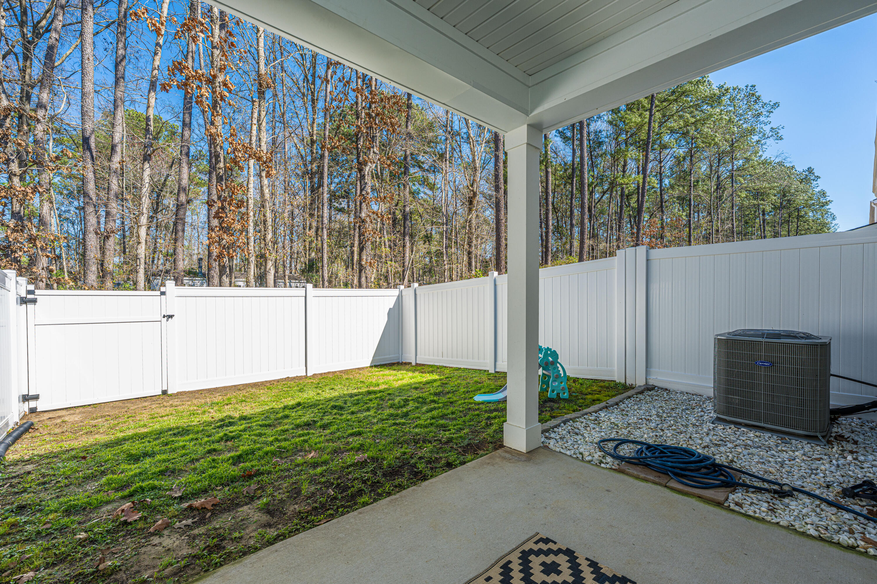 8016 Reagan Way North Charleston, SC 29418 - Photo 31 of 33 Fenced In and Covered Back Porch
