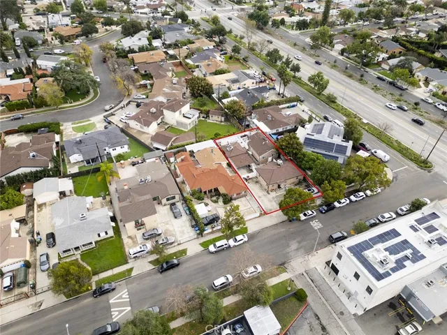 an aerial view of a city with lots of residential buildings