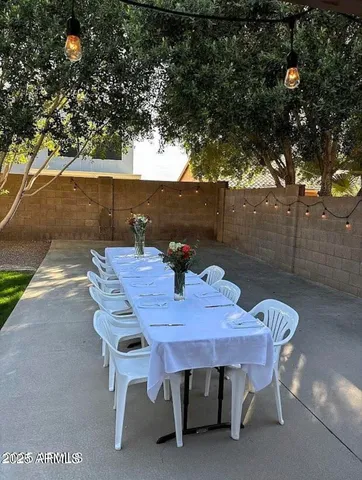 a view of a outdoor seating area with furniture