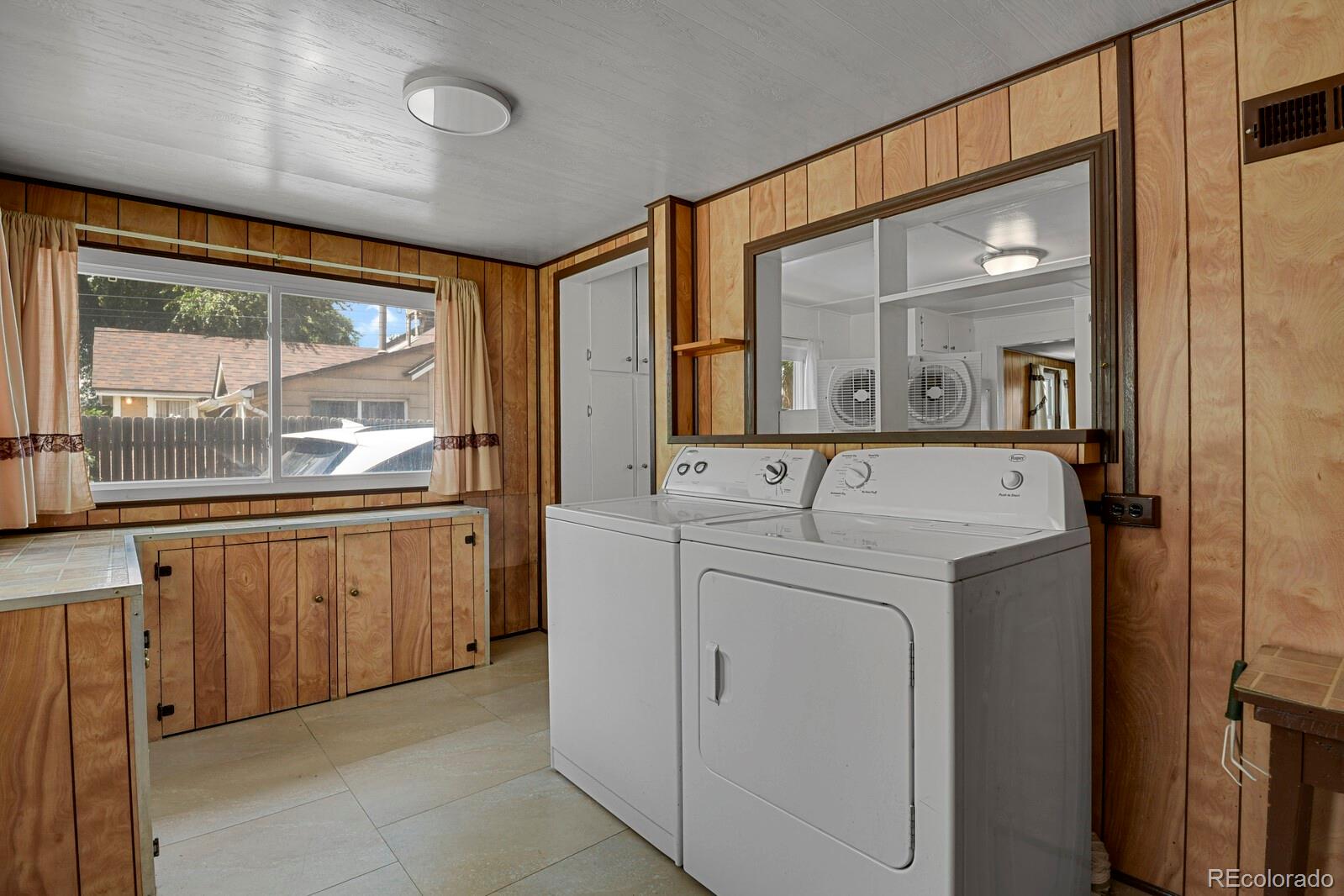 12400 West 44th Avenue Wheat Ridge, CO 80033 - Photo 16 of 31 a utility room with dryer and washer