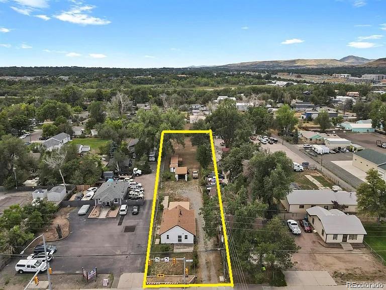 12400 West 44th Avenue Wheat Ridge, CO 80033 - Photo 2 of 31 an aerial view of multiple house