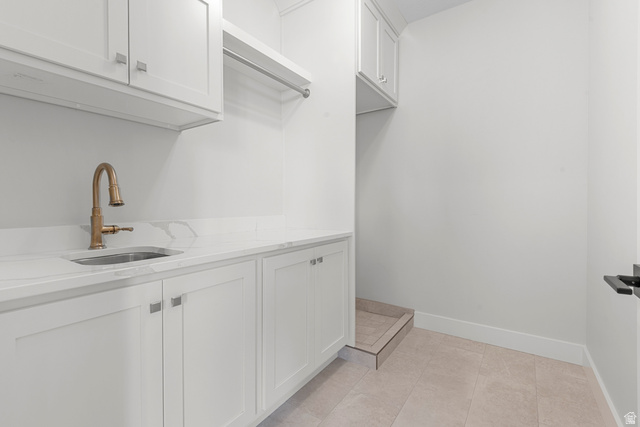 250 South Main Street, Unit 24 Alpine, UT 84004 - Photo 24 of 50 Laundry area with a sink and light tile patterned floors