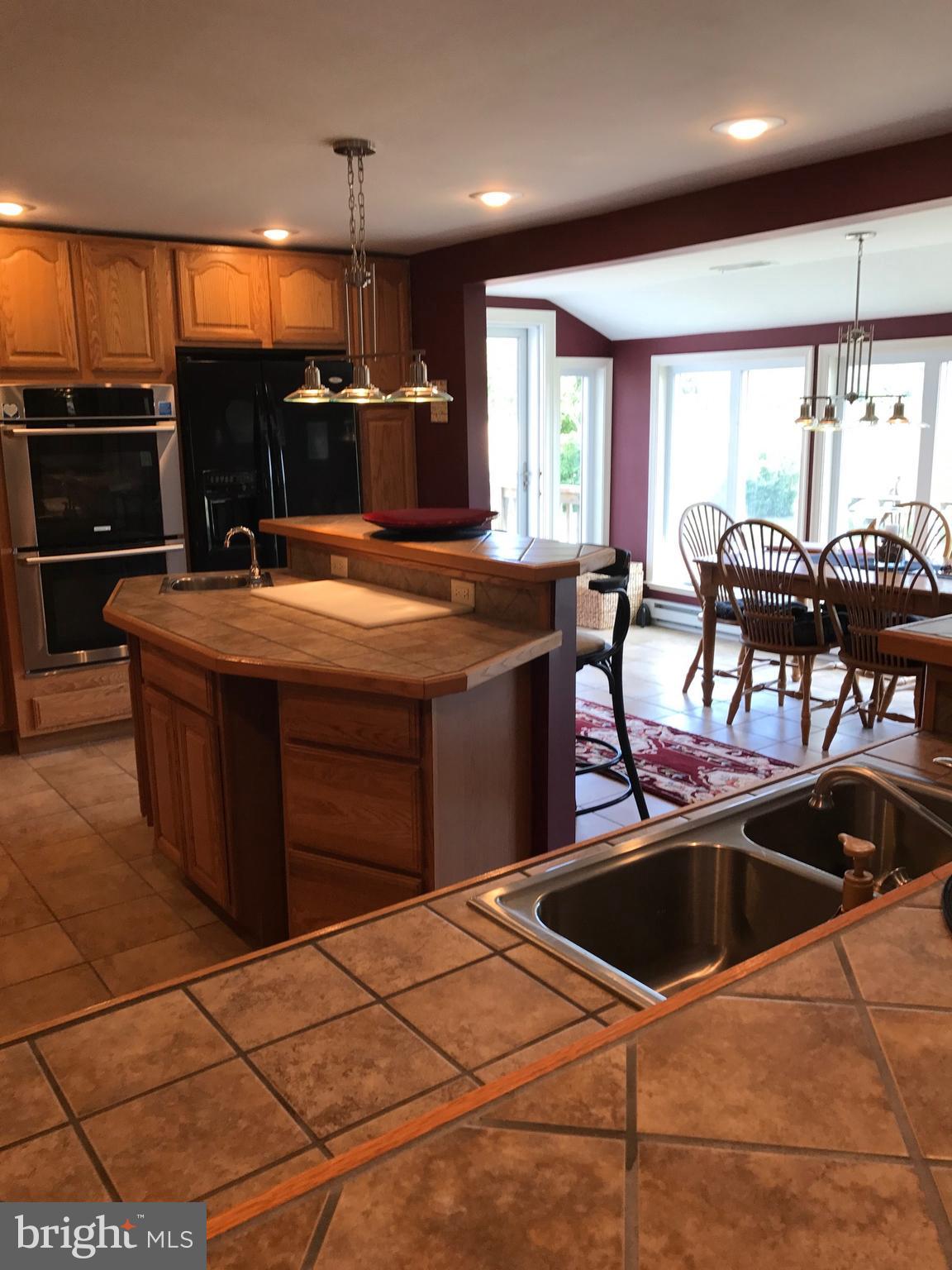 8125 Bethel Road Willards, MD 21874 - Photo 6 of 27 Kitchen into dining area