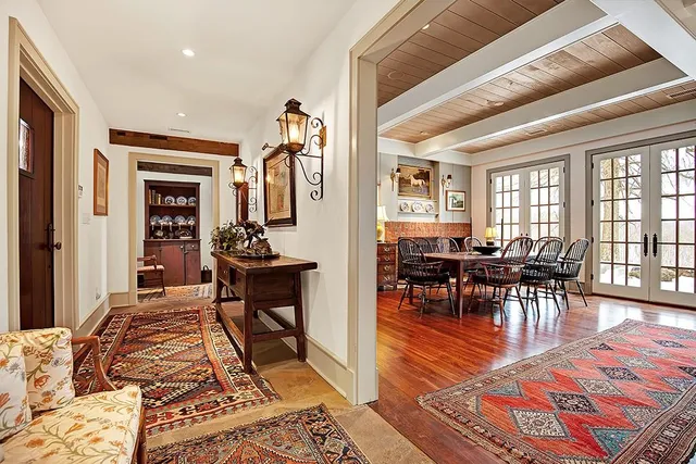 a view of a livingroom with furniture window and wooden floor