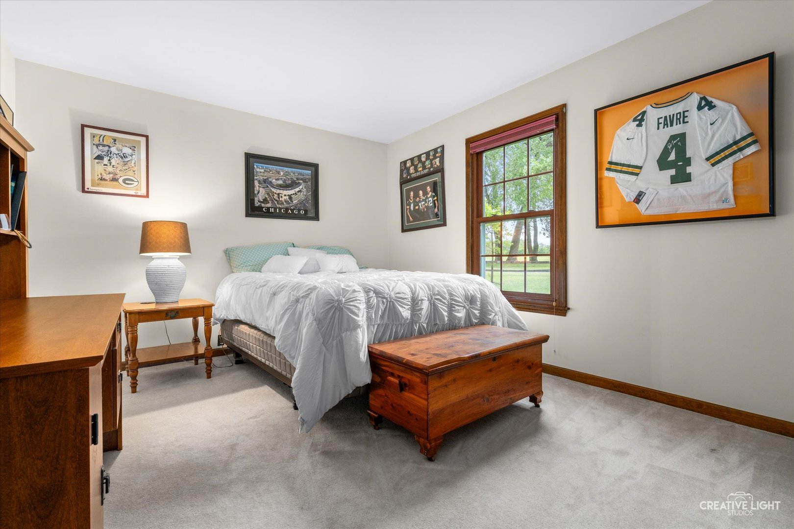 312 Dunham Place Commons, Unit 312 St. Charles, IL 60174 - Photo 16 of 28 a bedroom with a bed and a window