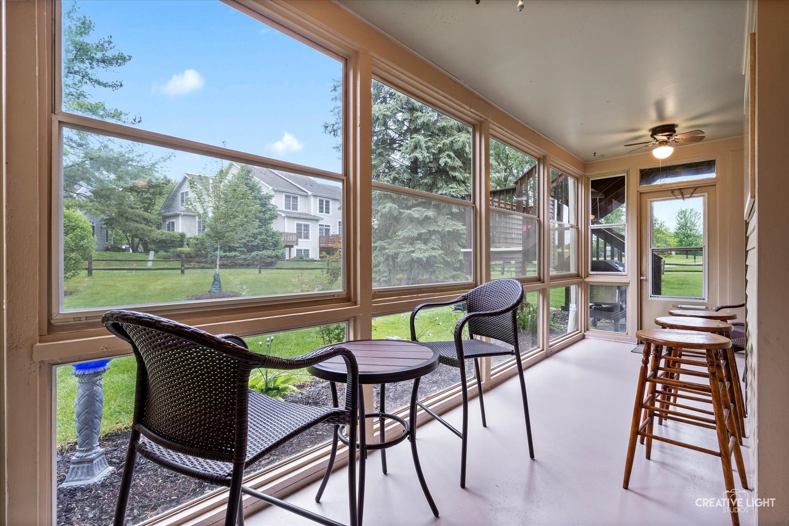 312 Dunham Place Commons, Unit 312 St. Charles, IL 60174 - Photo 19 of 28 a view of a dining room with furniture window and outside view