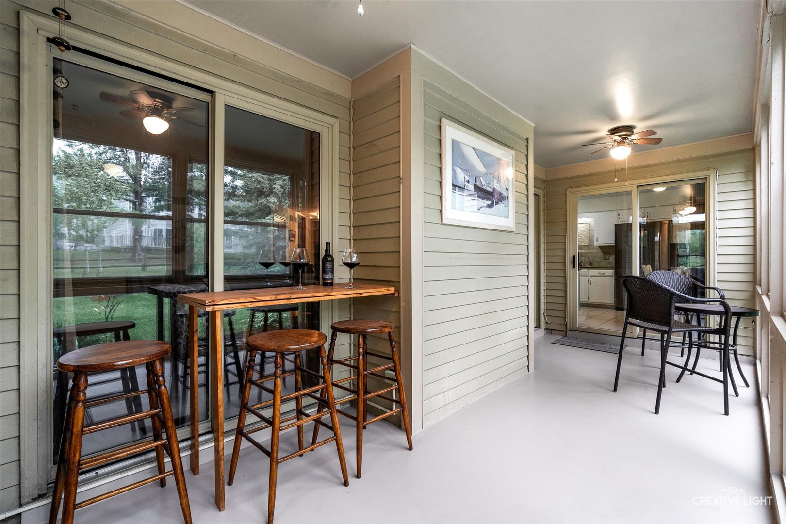 312 Dunham Place Commons, Unit 312 St. Charles, IL 60174 - Photo 20 of 28 a view of a dining room with furniture window and outside view
