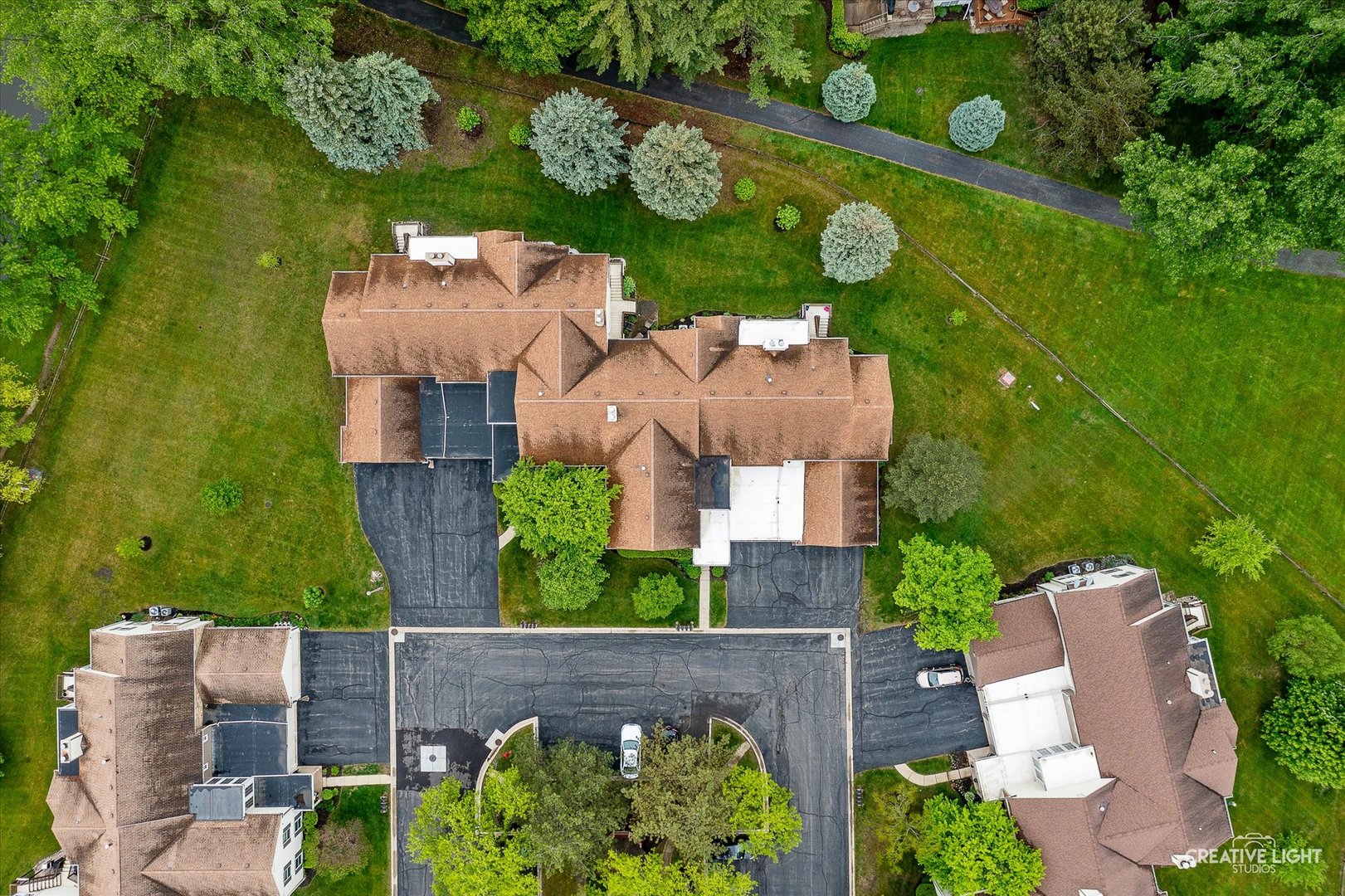 312 Dunham Place Commons, Unit 312 St. Charles, IL 60174 - Photo 27 of 28 an aerial view of a house with garden space and street view