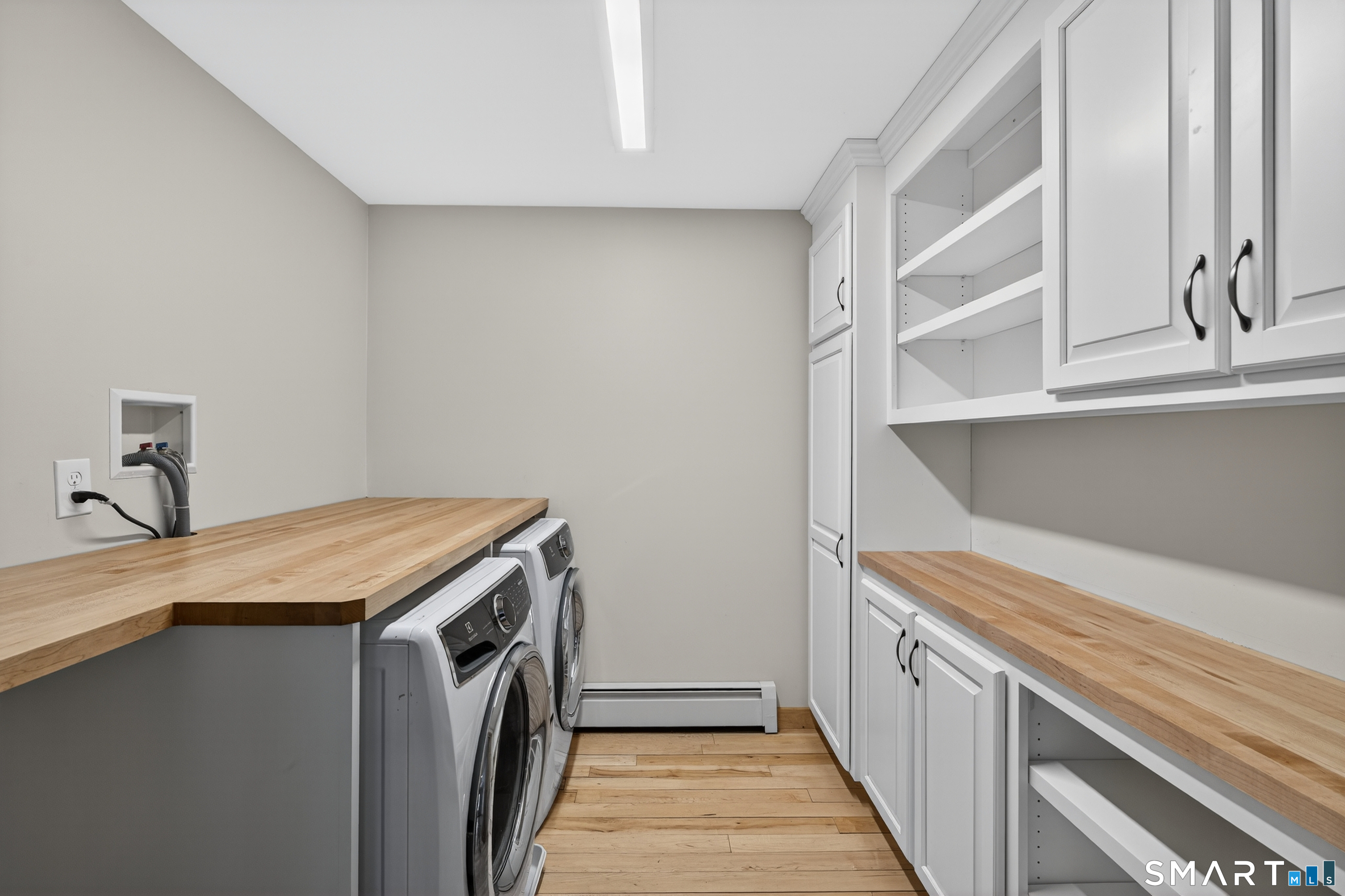 86 Hi-Lea Farm Road Colchester, CT 06415 - Photo 32 of 49 LAUNDRY ROOM SECOND LEVEL OFF PRIMARY SUITE SITTING ROOM