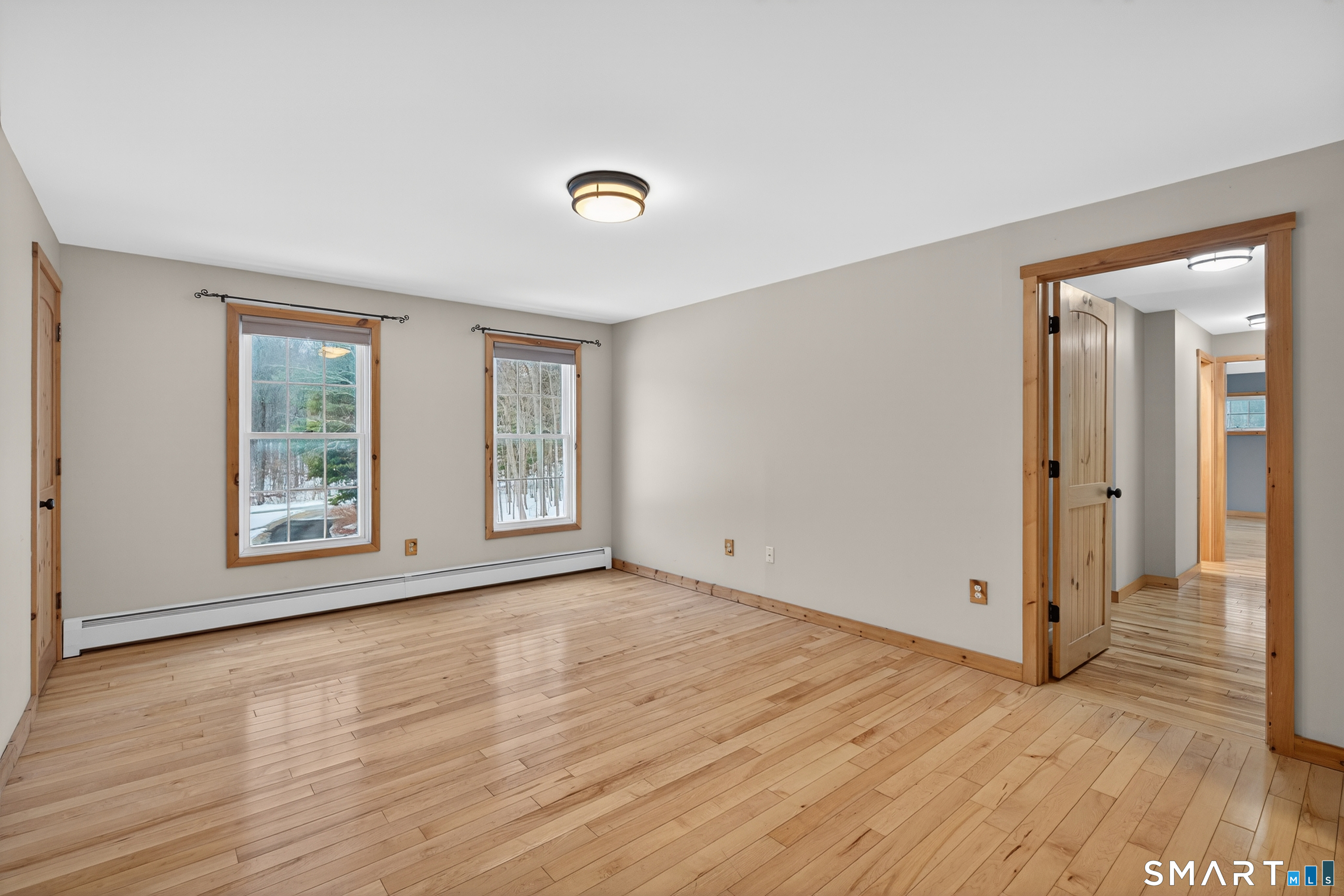 86 Hi-Lea Farm Road Colchester, CT 06415 - Photo 35 of 49 sitting room looking into bedroom twin closets off to either side in hallway to the right of photo