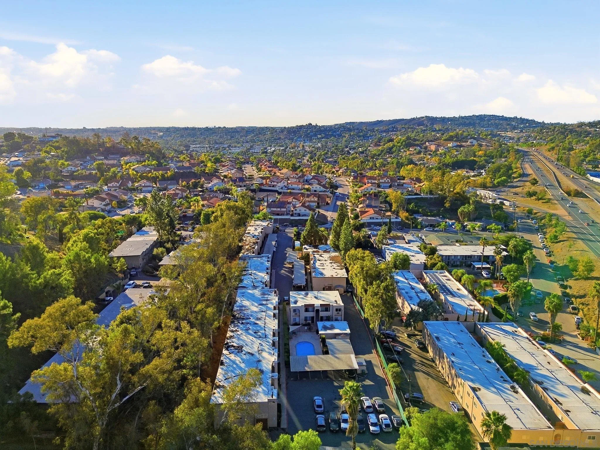 3557 Kenora Drive, Unit 31 Spring Valley, CA 91977 - Photo 21 of 24 an aerial view of residential houses with outdoor space