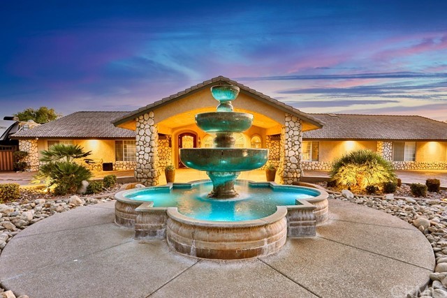 15296 Riverside Drive Apple Valley, CA 92307 - Photo 1 of 1 a view of a swimming pool with outdoor seating
