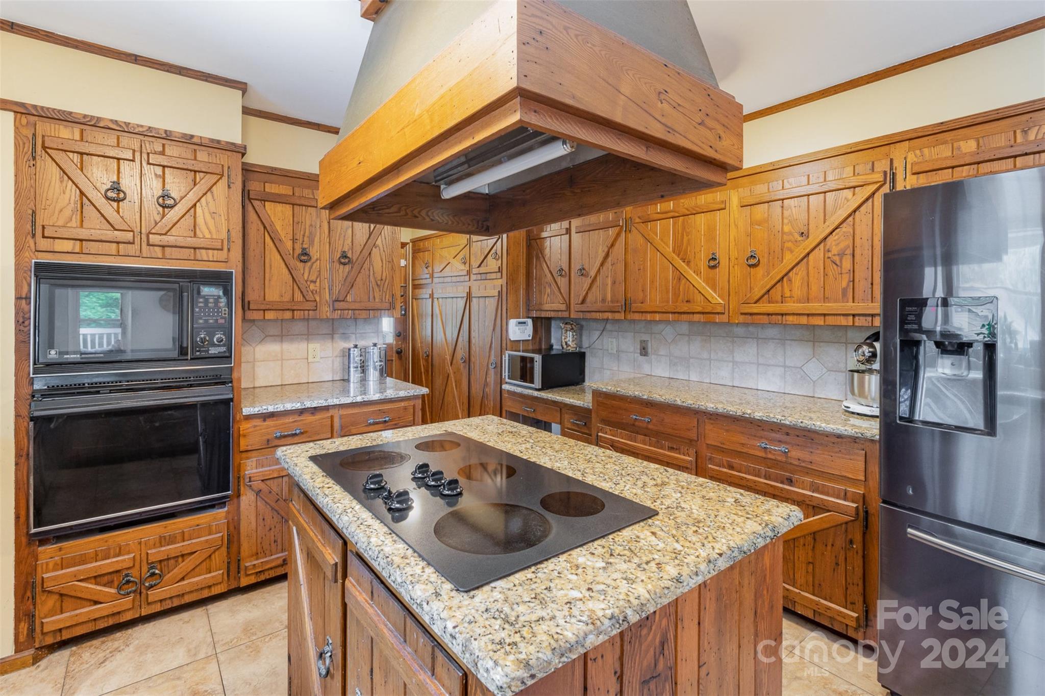 808 Dogwood Drive Lowell, NC 28098 - Photo 12 of 36 a kitchen with a sink stove and refrigerator