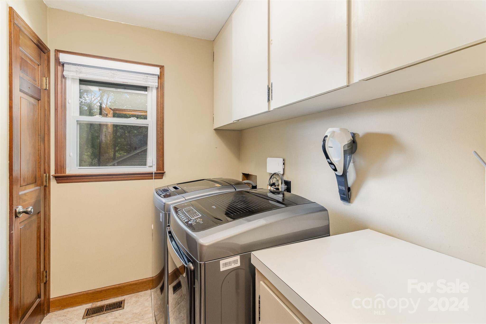 808 Dogwood Drive Lowell, NC 28098 - Photo 13 of 36 a utility room with dryer and washer